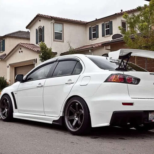 Tapas laterales (spats) Evo X