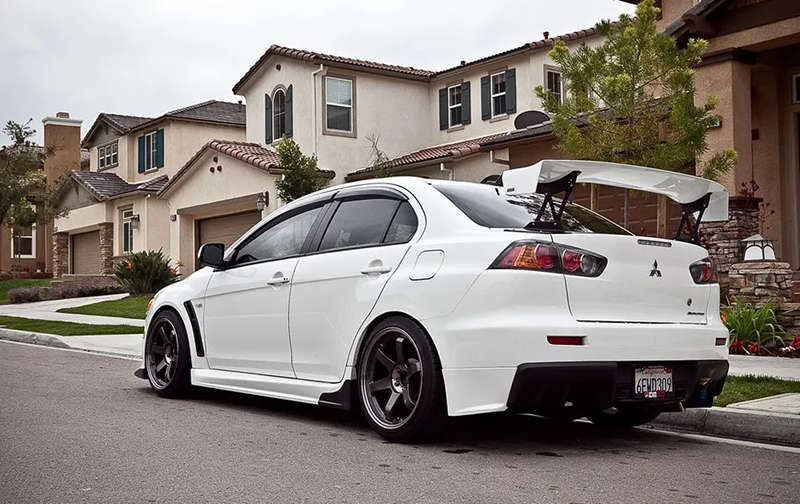 Tapas laterales (spats) Evo X